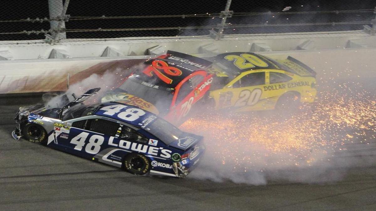Jimmie Johnson (48), Martin Truex Jr. (78), and Matt Kenseth (20) crash Thursday night during the second of two qualifying races for Sunday’s Daytona 500.