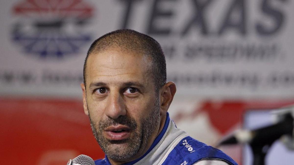 Tony Kanaan discusses a testing session at TMS last month.
