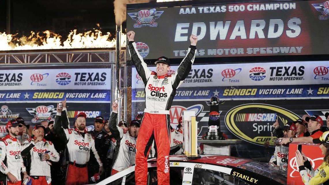 Carl Edwards celebrates winning the the AAA Texas 500 last November, which will be the last race under the former NASCAR points format.