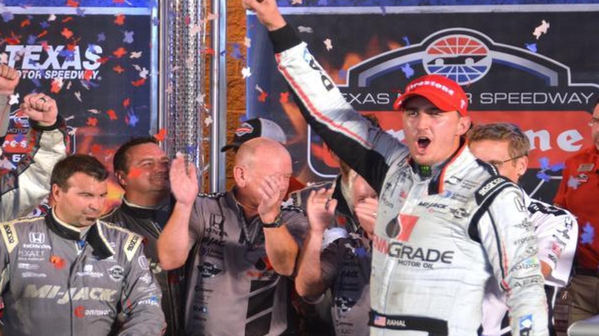 Graham Rahal celebrates in victory lane after his win in an IndyCar auto race at Texas Motor Speedway, Saturday in Fort Worth.