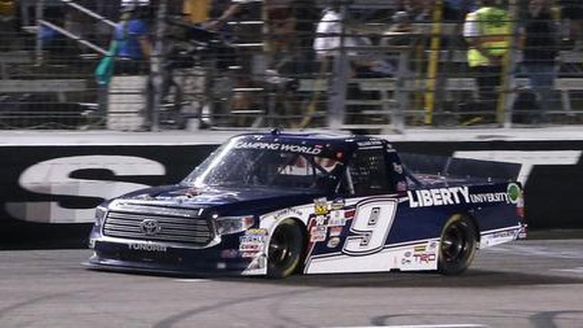 William Byron (9) wins the Rattlesnake 400 truck series race after taking the lead with five laps to go.