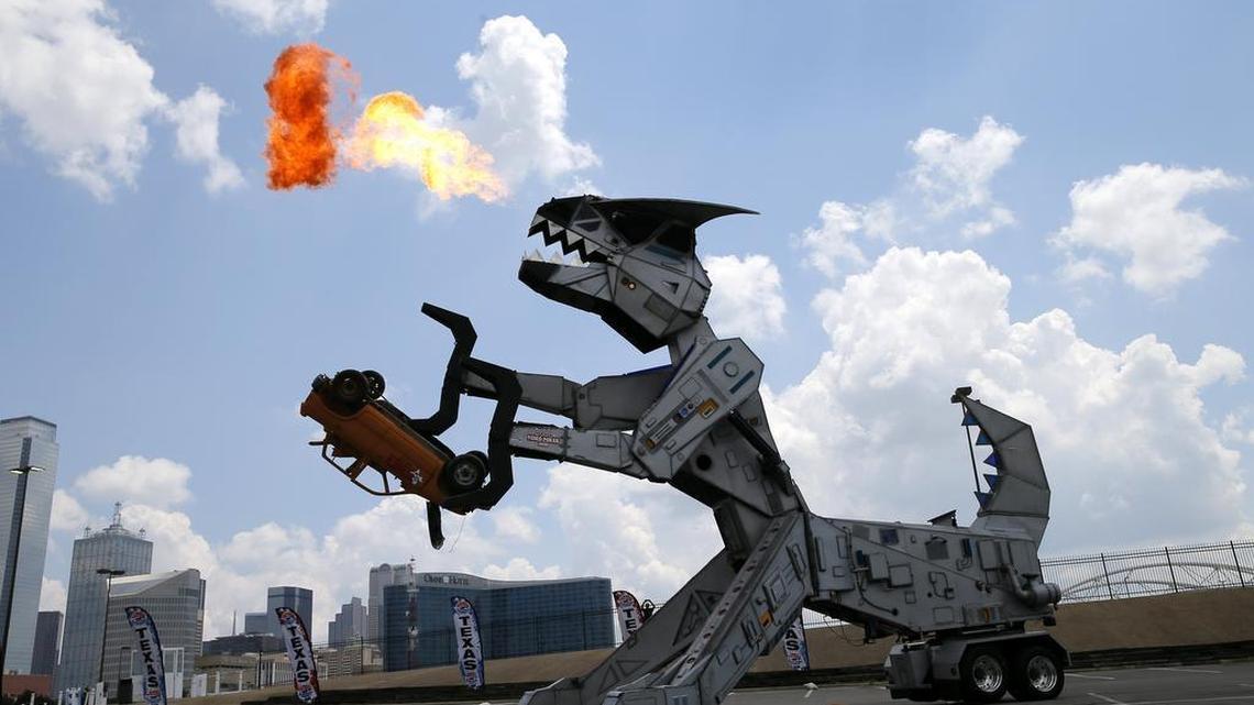 IndyCar driver Juan Pablo, behind the controls of a mechanical customized tractor trailer, crushed a car during a promotional stop in Dallas on Thursday.