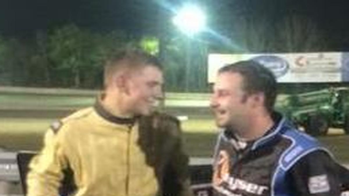 
Tyler Erb, left, with points leader Jon Mitchell.
