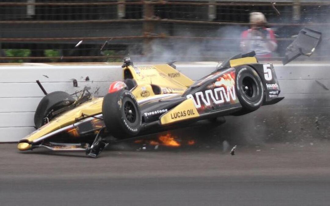 
James Hinchcliffe hits the wall during practice for the Indianapolis 500 on May 18. Hinchliffe was hospitalized for more than a week after suffering a serious thigh injury.
