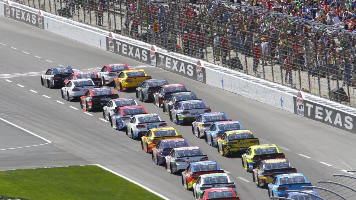 Pole qualifier Kevin Harvick leads the field across the start/finish line to begin the O’Reilly Auto Parts 500 in April at Texas Motor Speedway.