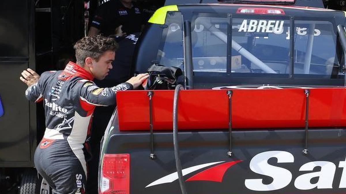 Rico Abreu, left, checks out his truck before Thursday’s practices for Friday’s Rattlesnake 400 truck series race at Texas Motor Speedway.