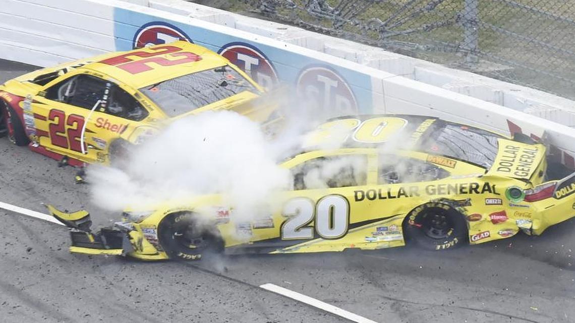 Matt Kenseth, right, slammed into Joey Logano with 46 laps remaining in the Sprint Cup auto race at Martinsville Speedway. Many feel Kenseth did it intentionally.