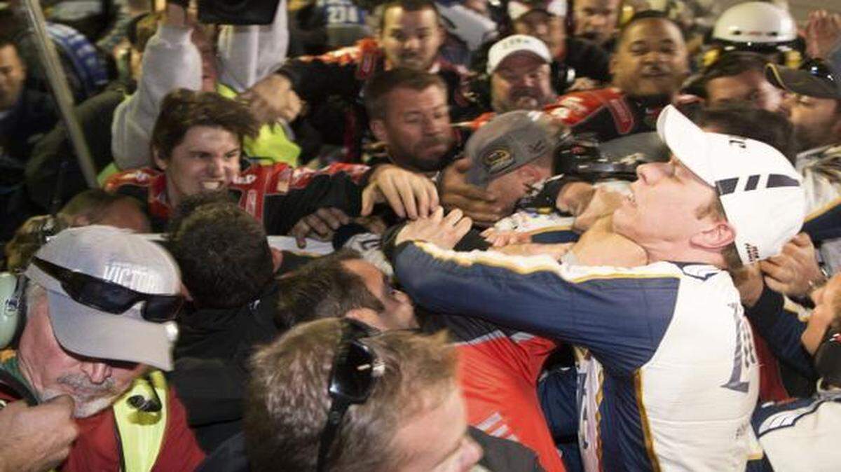 
Brad Keselowski, right, is punched as his crew brawls with Jeff Gordon’s after the NASCAR Sprint Cup Series auto race at Texas Motor Speedway in November. 
