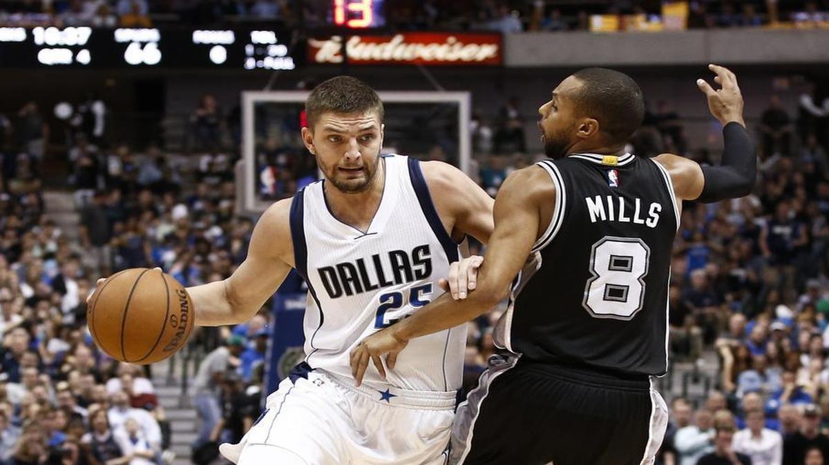 Chandler Parsons, left, the Dallas Mavericks and most of the NBA have run into a stone wall against Patty Mills and the San Antonio Spurs.