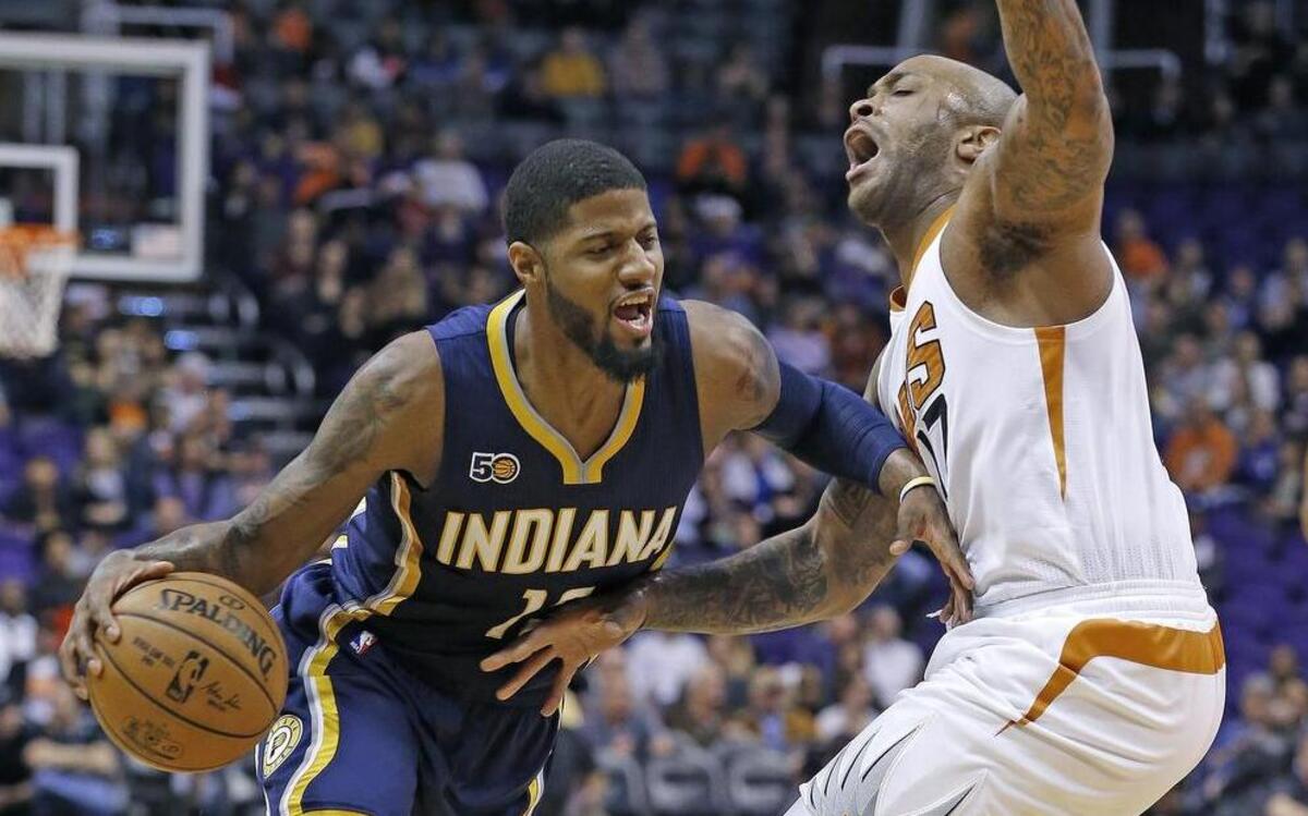 Paul George, left, averaging a team-leading 20-7 points and 7.4 rebounds, leads the Indiana Pacers into Friday’s game against the Mavericks in Dallas.