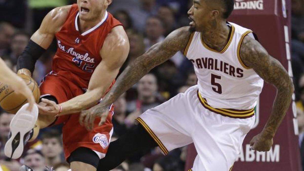
 Los Angeles Clippers forward Blake Griffin, left, is fouled by Cleveland’s J.R. Smith on Thursday. Griffin is sidelined at least until through the All-Star break 
