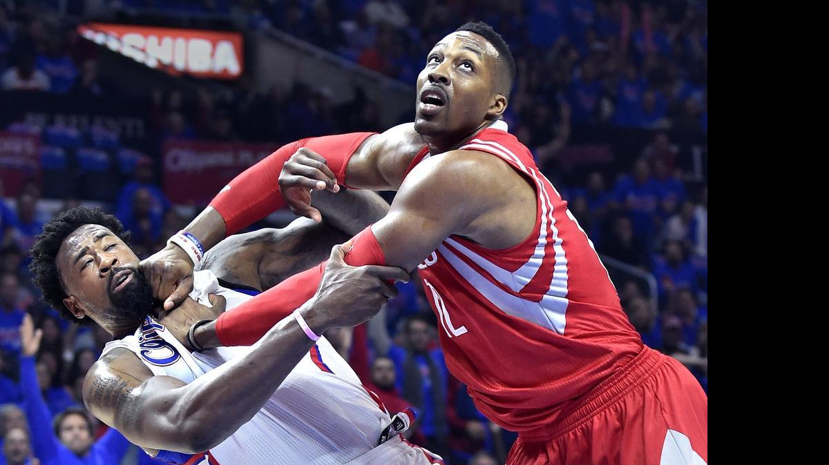 
The Los Angeles Clippers’ DeAndre Jordan, left, and the Houston Rockets’ Dwight Howard battled for rebound position in the playoffs in May. Jordan is a possible free-agent target for the Dallas Mavericks this summer; Howard was a Mavs target in the summer of 2013.
