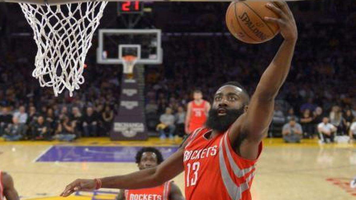 
Houston Rockets guard James Harden, right, leads the NBA in scoring at 27.6 points but has averaged more than 37 points a game over his last four outings.


