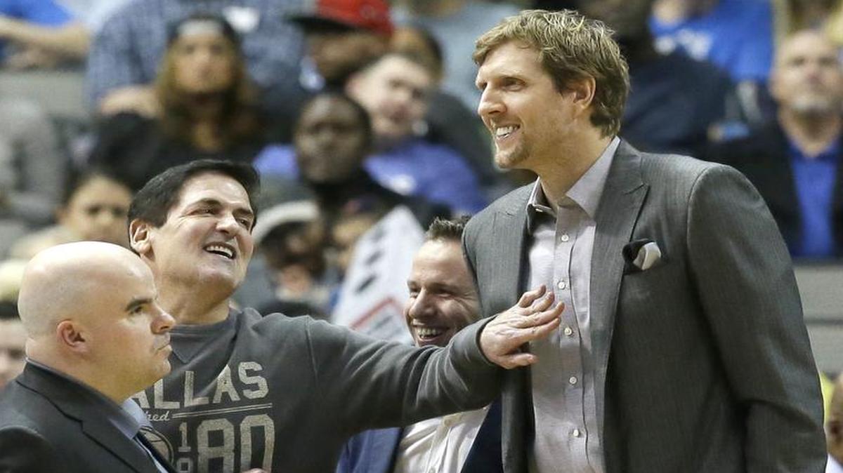 Mavericks forward Dirk Nowitzki, right, has missed the bulk of this season with an Achilles injury. Team owner Marc Cuban said Nowitzki could resume practicing next week.