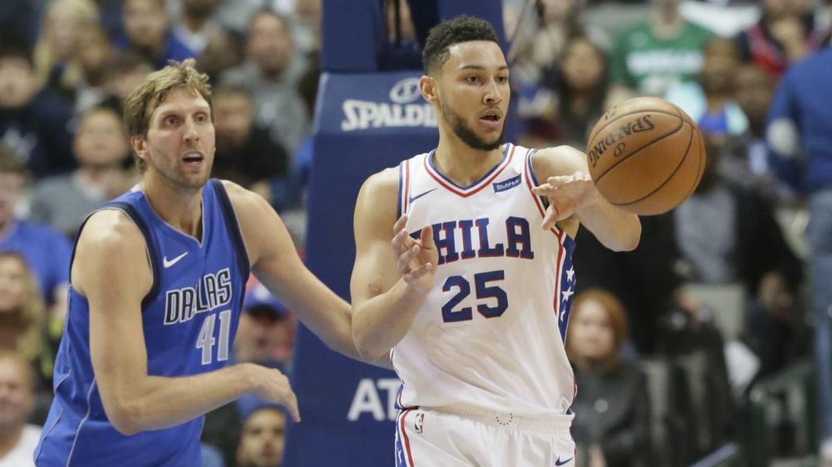 Philadelphia 76ers guard Ben Simmons (25) passes off against Dallas Mavericks forward Dirk Nowitzki. Simmons, the first overall pick in 2016, had 23 points, seven rebounds and eight assists in a 112-110 win in Dallas.
