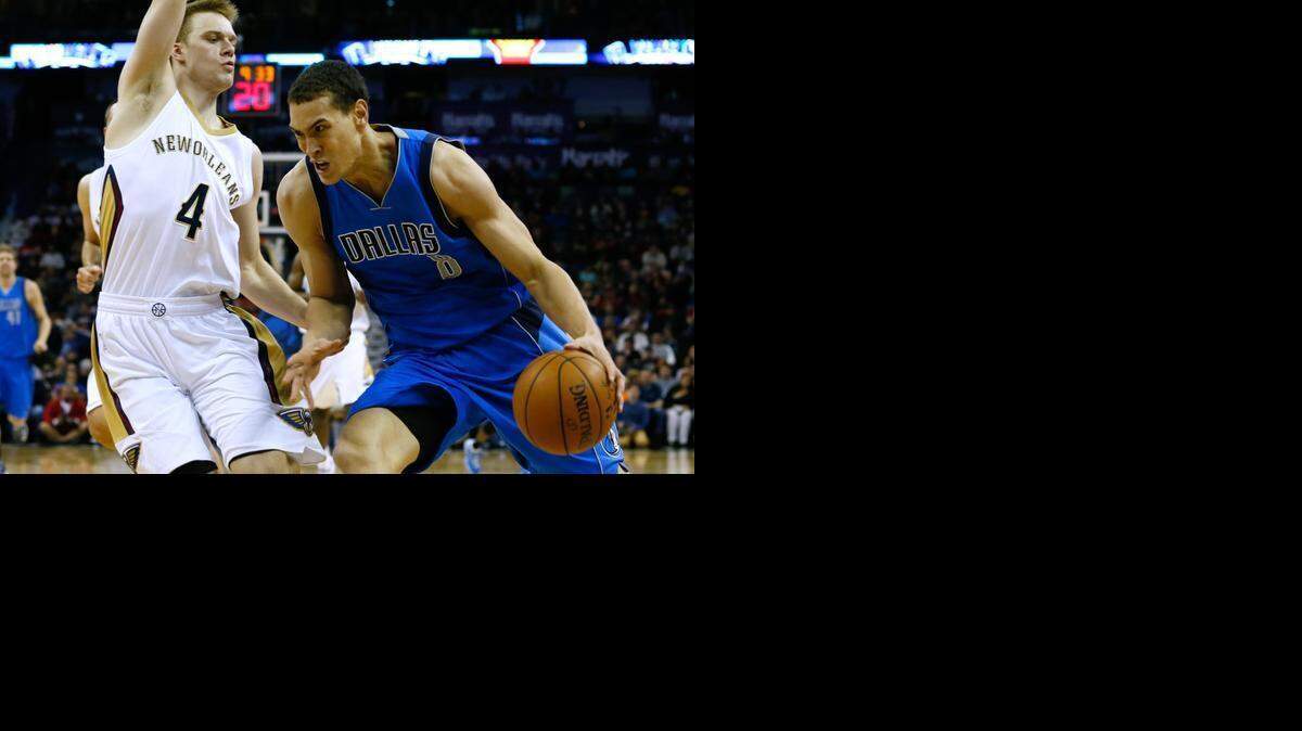 
Mavericks forward Dwight Powell, right, was a member of four franchises in the first six months of his NBA career.


