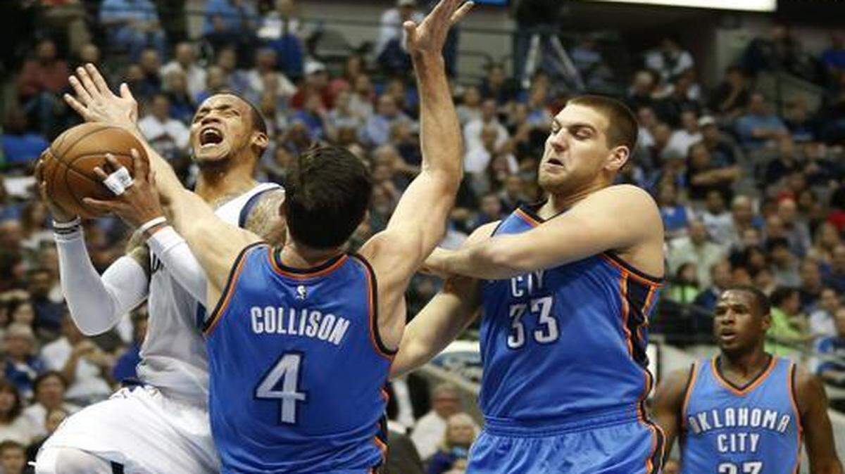
Monta Ellis, left, finished with 24 points and five rebounds to help the Mavericks take down Nick Collison and Mitch McGary on Monday night at American Airlines Center.


