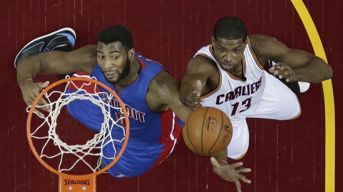 Pistons center Andre Drummond, left, battling the Cavaliers’ Tristan Thompson at the basket, leads the NBA in rebounds (15.1 per game) and double-doubles (53) entering Wednesday’s game against the Mavericks (7:30 p.m., FSSW).