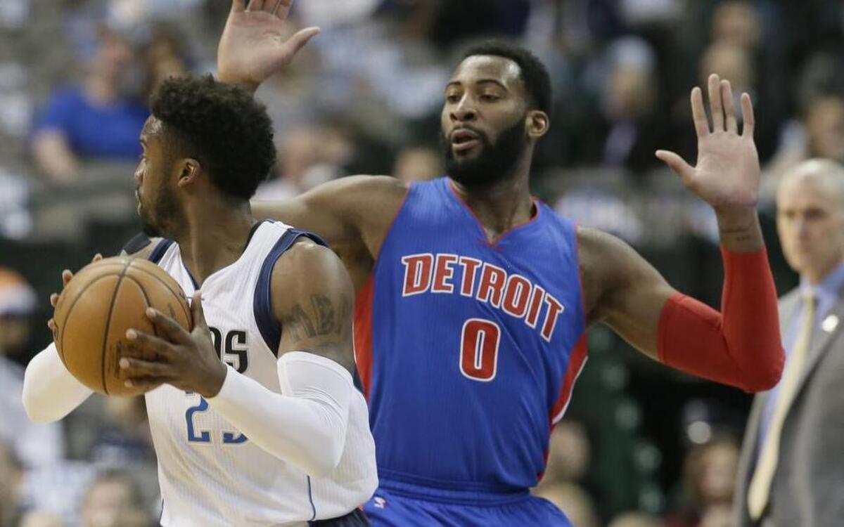 Mavericks guard Wesley Matthews, left, couldn’t get past the Pistons and center Andre Drummond, who finished with 17 rebounds in Detroit’s victory.