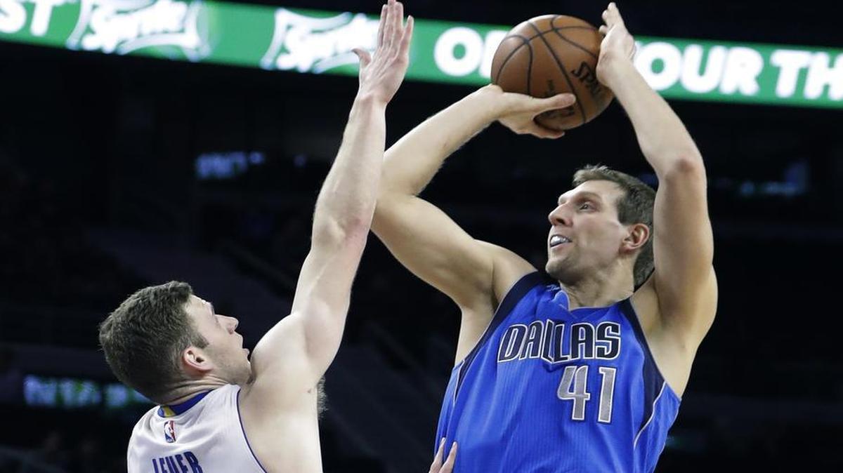 Dallas Mavericks forward Dirk Nowitzki, shooting over Detroit Pistons forward Jon Leuer, finished with 24 points and 10 rebounds Wednesday.