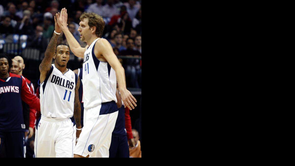 
Dallas Mavericks shooting guard Monta Ellis, left, and and power forward Dirk Nowitzki are ill and might night play against the Los Angeles Lakers Friday night.
