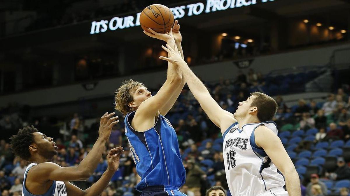 Nemanja Bjelica, right, and the Minnesota Timberwolves had little luck stopping Dirk Nowitzki, who scored 29 points for the Dallas Mavericks.