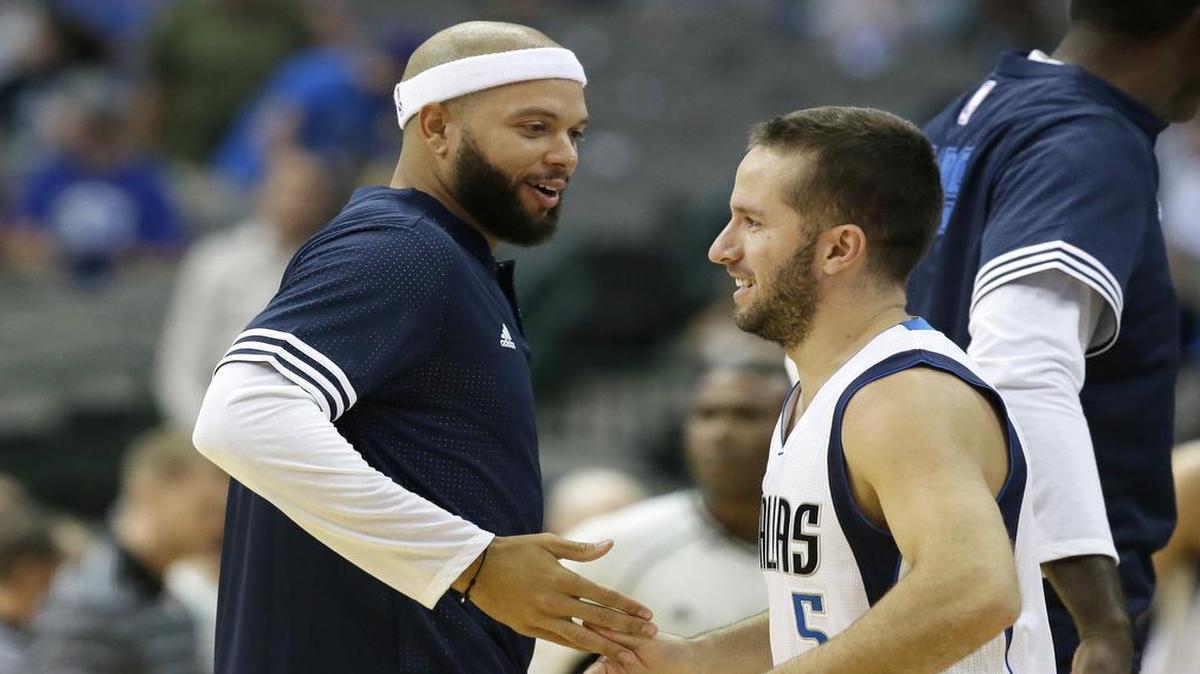 
Deron Williams, left, with teammate J.J. Barea, has a strained right calf and will miss the remainder of the preseason.

