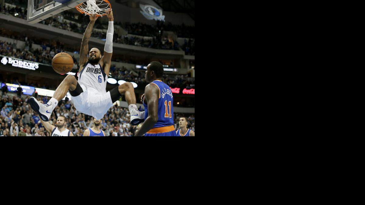 
Mavericks center Tyson Chandler dunks in front of the Knicks’ Samuel Dalembert on Nov. 26. Chandler scored 17 points with a season-high 25 points in Dallas’ overtime victory.


