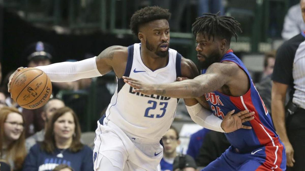 Dallas Mavericks guard Wesley Matthews (23) dribbles against Detroit Pistons forward Reggie Bullock (25) during the first half of an NBA basketball game in Dallas, Wednesday, Dec. 20, 2017.