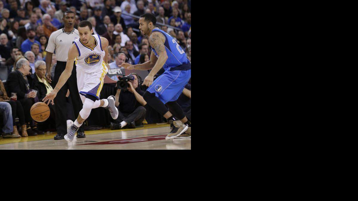 
Golden State Warriors' Stephen Curry scored 51 points against the Dallas Mavericks Wednesday night.
