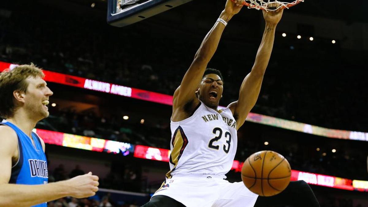 Pelicans forward Anthony Davis, dunking against the Mavericks and Dirk Nowitzki last season, averages a team-high 23.1 points, 11 rebounds and 2.7 blocks heading into Saturday’s matchup in Dallas.