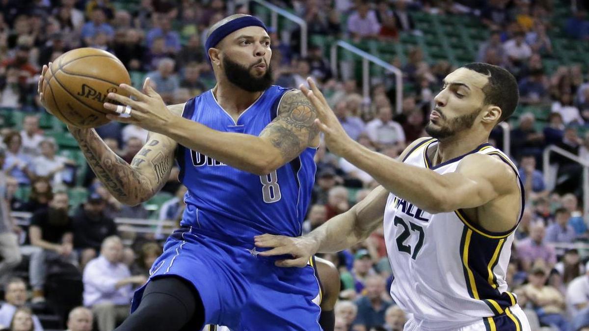 In his second game back from being sidelined with a sports hernia, Mavericks guard Deron Williams, left, scored 23 points against the Utah Jazz and center Rudy Gobert.