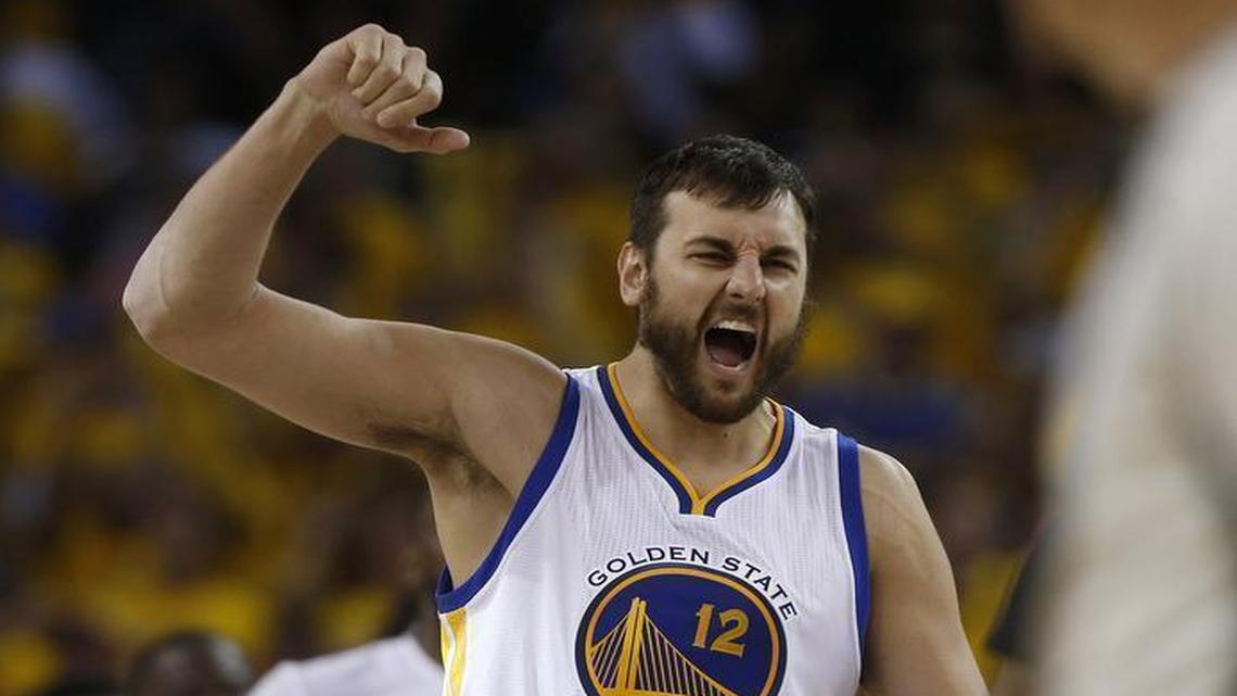 Golden State Warriors’ Andrew Bogut (12) celebrates a basket by Golden State Warriors’ Leandro Barbosa (19) during their game against the Cleveland Cavaliers during the fourth quarter on Sunday, June 5, 2016, at Oracle Arena in Oakland, Calif.