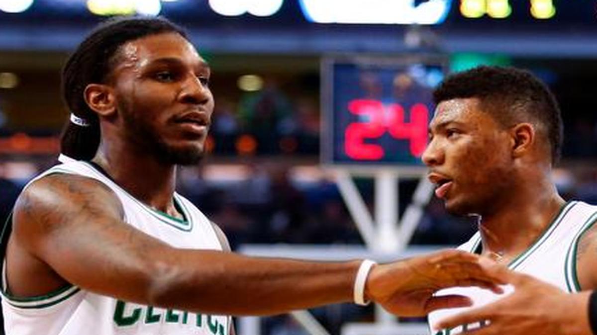 Jae Crowder, left, and Marcus Smart, with teammate Jared Sullinger, are key players in the Celtics’ resurgence and have local ties. Crowder spent two-plus seasons with the Mavericks, and Smart is a former Flower Mound Marcus standout.