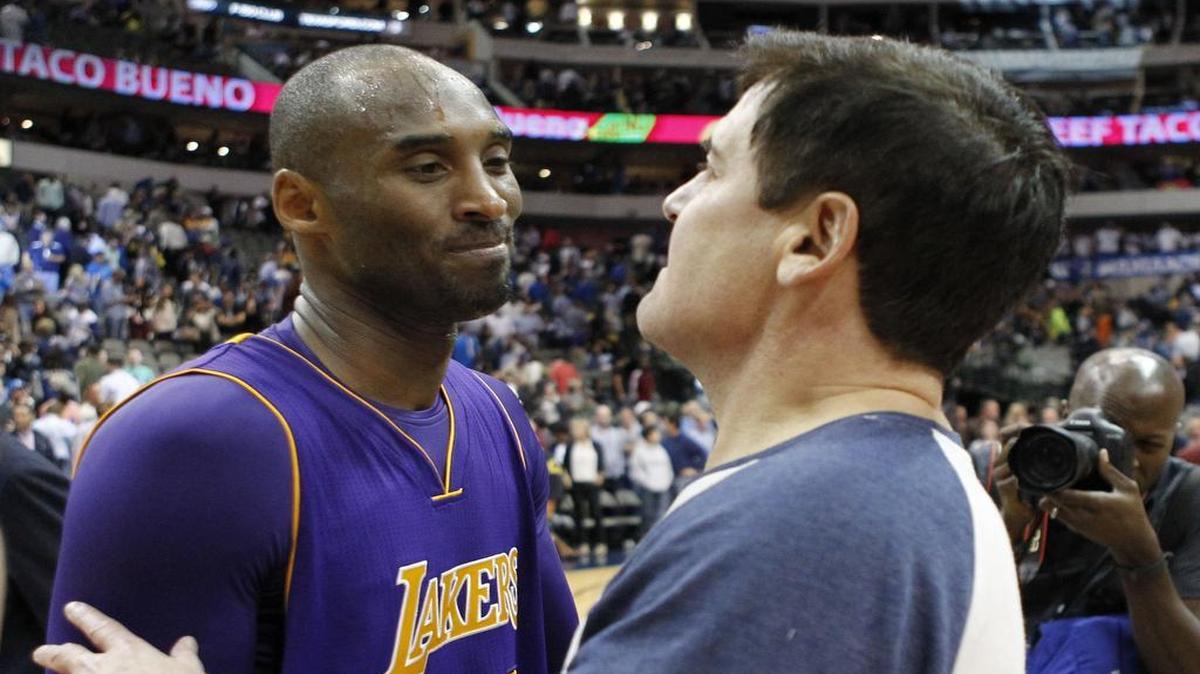 Lakers forward Kobe Bryant (24) talks with Mavericks owner Mark Cuban after a Mavs’ victory in November.
