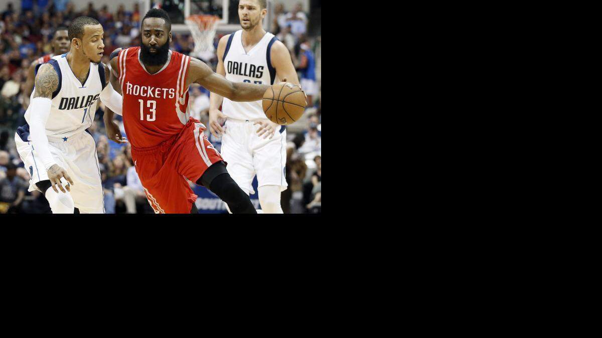 
The Mavericks’ Monta Ellis, left, tries to stop MVP candidate James Harden and the Rockets on Thursday night.
