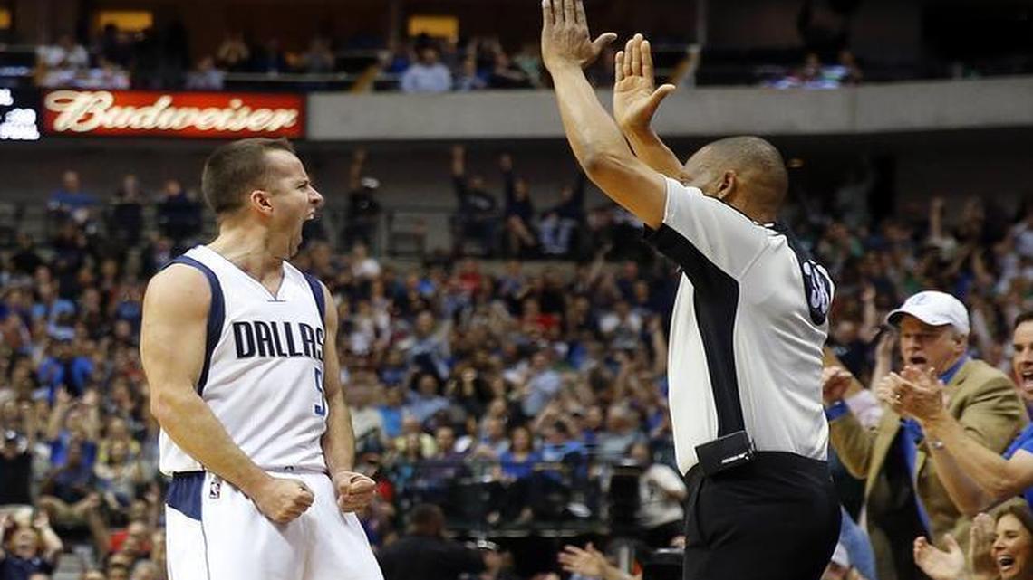 Dallas Mavericks guard J.J. Barea (5) screams at the crowd after burying a three-pointer against the Houston Rockets during the second quarter on Wednesday, April 6, 2016, at the American Airlines Center in Dallas.