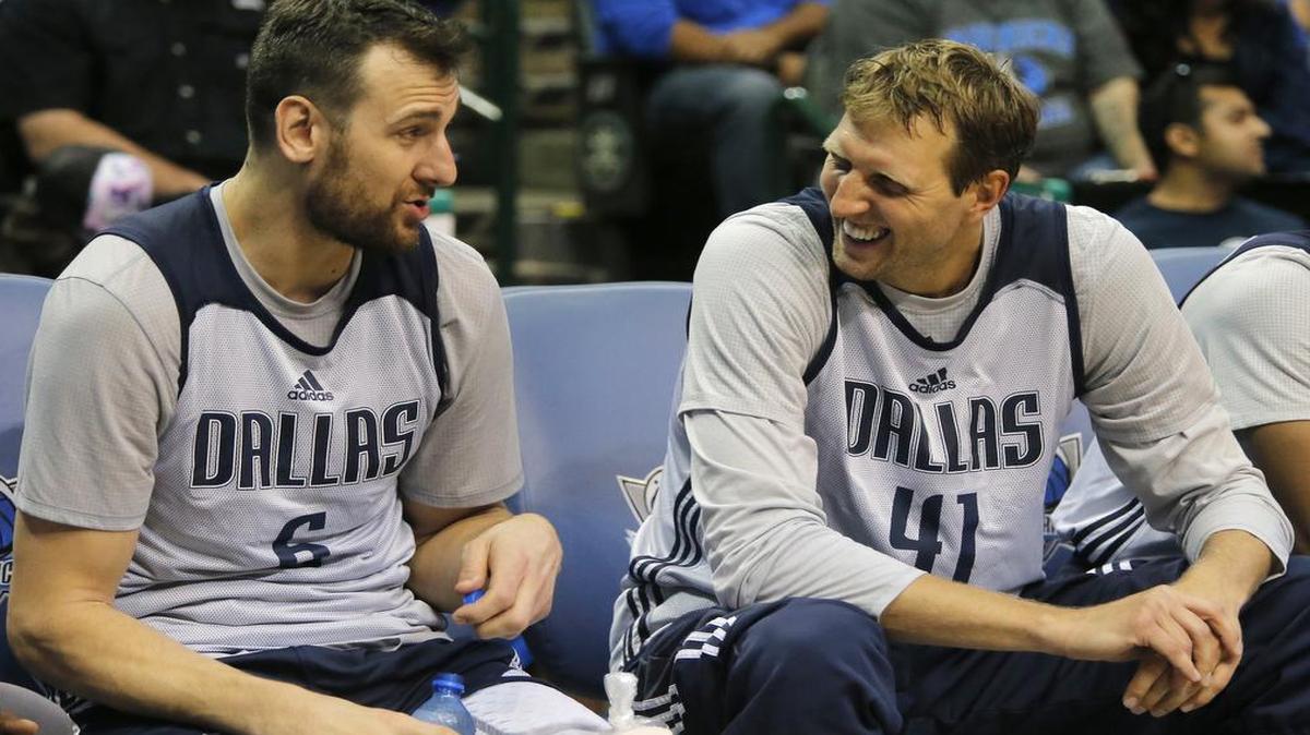 Dirk Nowitzki, right, chats with new teammate Andrew Bogut on the bench during the Mavericks’ open practice at the American Airlines Center on Sept. 28.