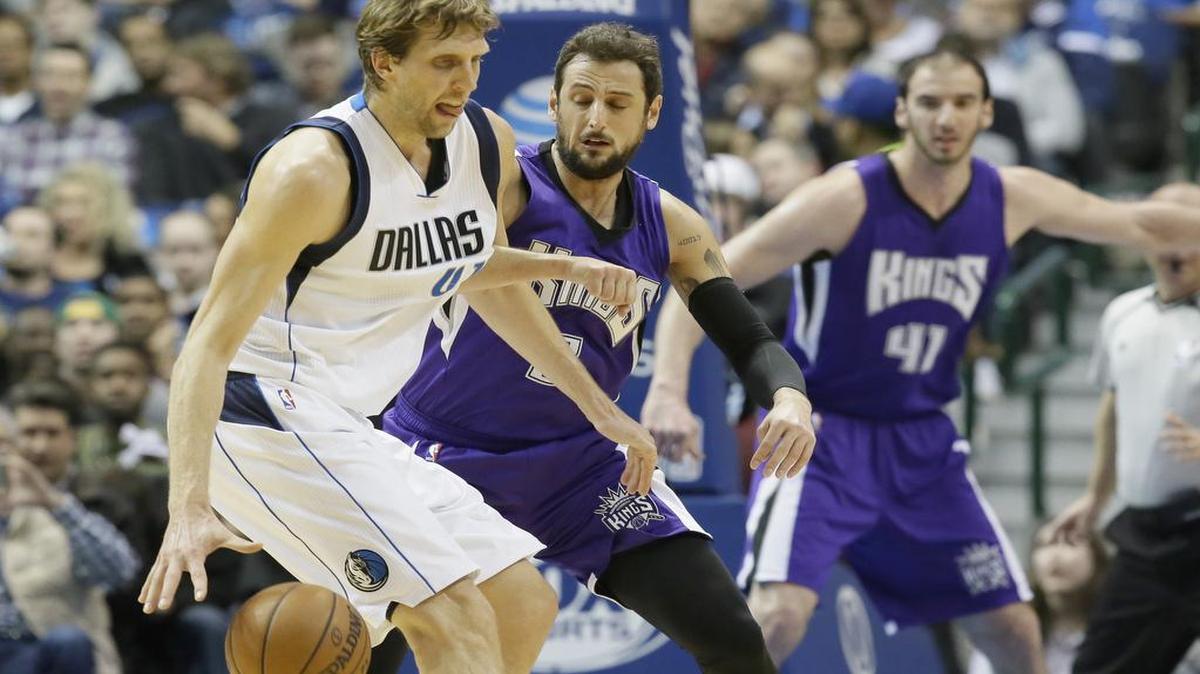 Coach Rick Carlisle says the team is “keeping a very close eye” on 37-year-old Dirk Nowitzki, left, as the Mavericks play 18 games in January.