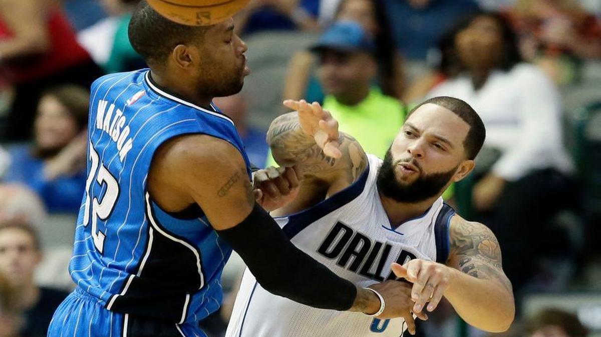 Dallas Mavericks guard Deron Williams (8) passes against Orlando Magic guard C.J. Watson (32) during the first half in Dallas on Saturday, Feb. 11, 2017. Williams had seven points, four assists and three steals in playing only in the first half in his return after an eight-game injury absence.