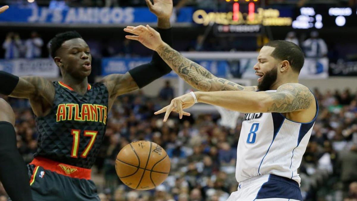 Atlanta Hawks defender Dennis Schroder (17) makes Dallas Mavericks guard Deron Williams (8) lose control of the ball during the first half of an NBA basketball game in Dallas, Saturday, Jan. 7, 2017.