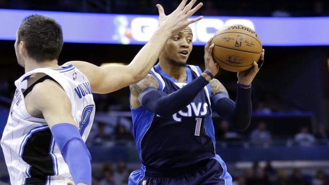 
Monta Ellis, right, overcame Nikola Vucevic and the Magic with game highs of 25 points and 13 assists.


