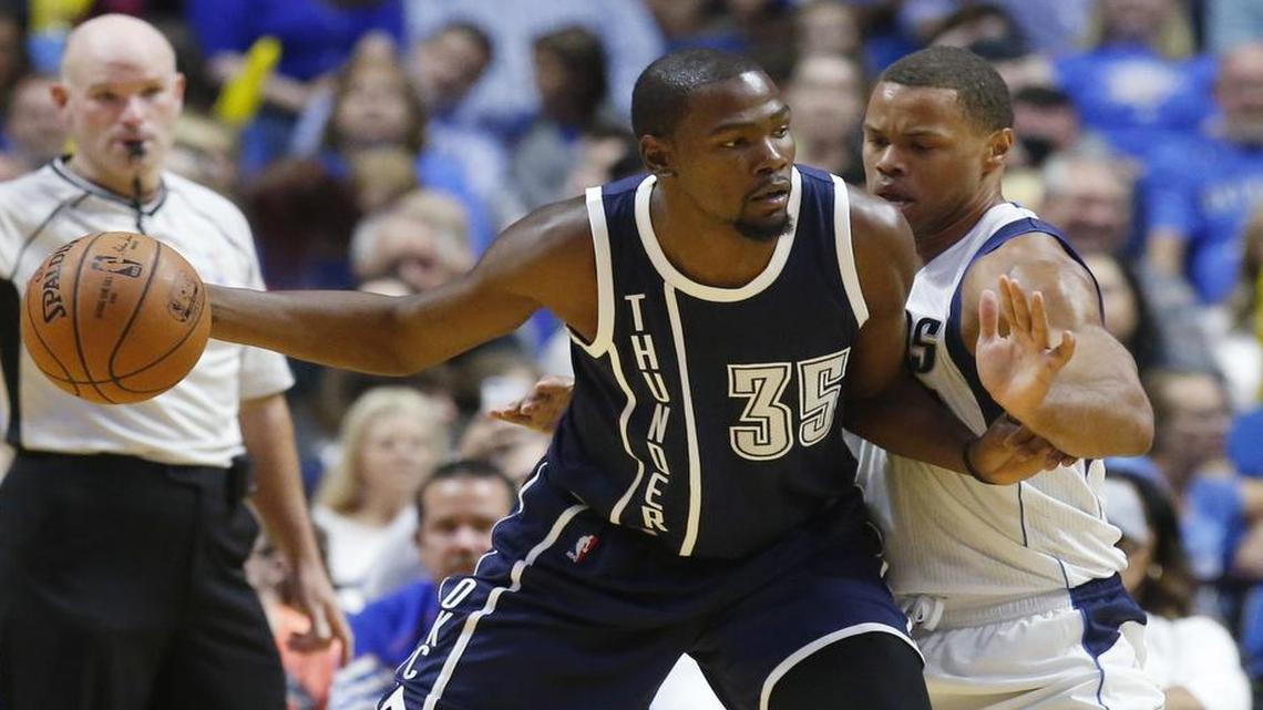 
Mavericks rookie Justin Anderson, right, defending Thunder star Kevin Durant, scored 11 points on 5-of-13 shooting including a monster dunk over Serge Ibaka.


