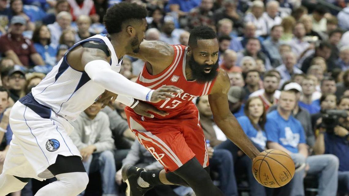 Houston Rockets guard James Harden, right, had a game-high 34 points against guard Wesley Matthews and the Dallas Mavericks.