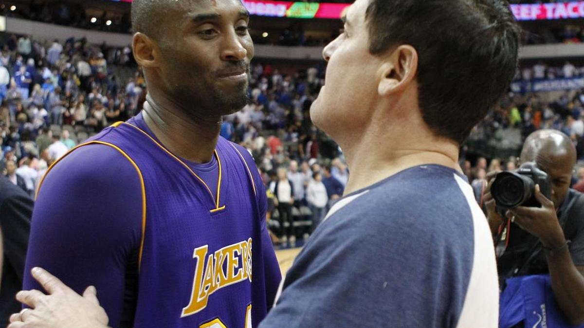 Los Angeles Lakers forward Kobe Bryant (24) hugged Dallas Mavericks owner Mark Cuban after the game on Nov. 13, which turns out to be Bryant’s final game in Dallas. The Lakers lost to the Mavericks 90-82.