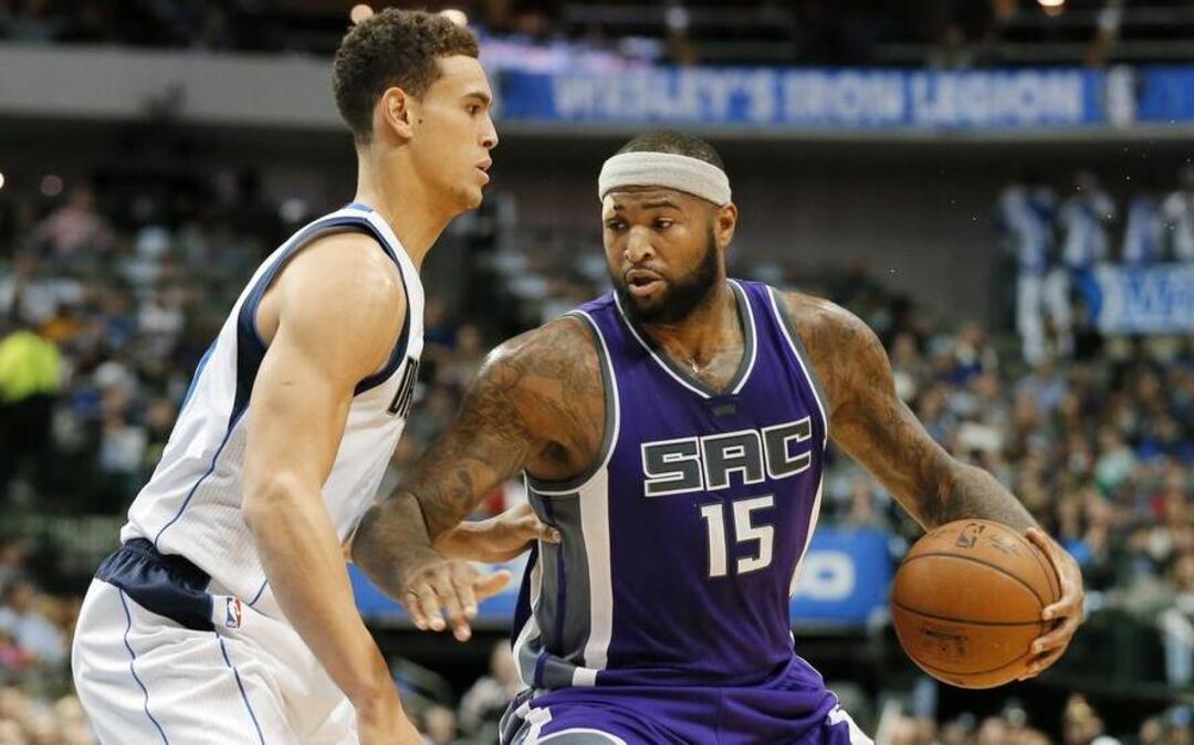 Sacramento Kings center DeMarcus Cousins, right, bullied Dwight Powell and the Mavericks in a 31-point romp earlier this month. Cousins had 24 points, 14 rebounds, seven assists and three blocks. The teams meet again on Sunday in Dallas at 3 p.m. on FSSW.