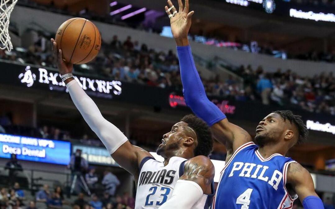 Dallas Mavericks guard Wesley Matthews, left, won’t have to worry about Nerlens Noel blocking his shot anymore since Noel was traded to Dallas on Thursday. Noel is scheduled to make his Mavericks debut at 7:30 p.m. Saturday.