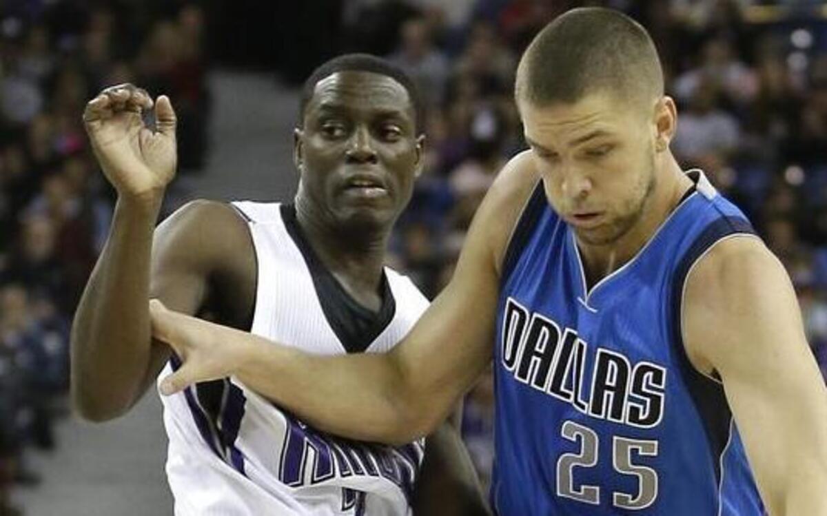 Dallas Mavericks forward Chandler Parsons, right, drives against Sacramento Kings guard Darren Collison last week. Parsons may continue his role as sixth man during his recovery from off-season knee surgery.
