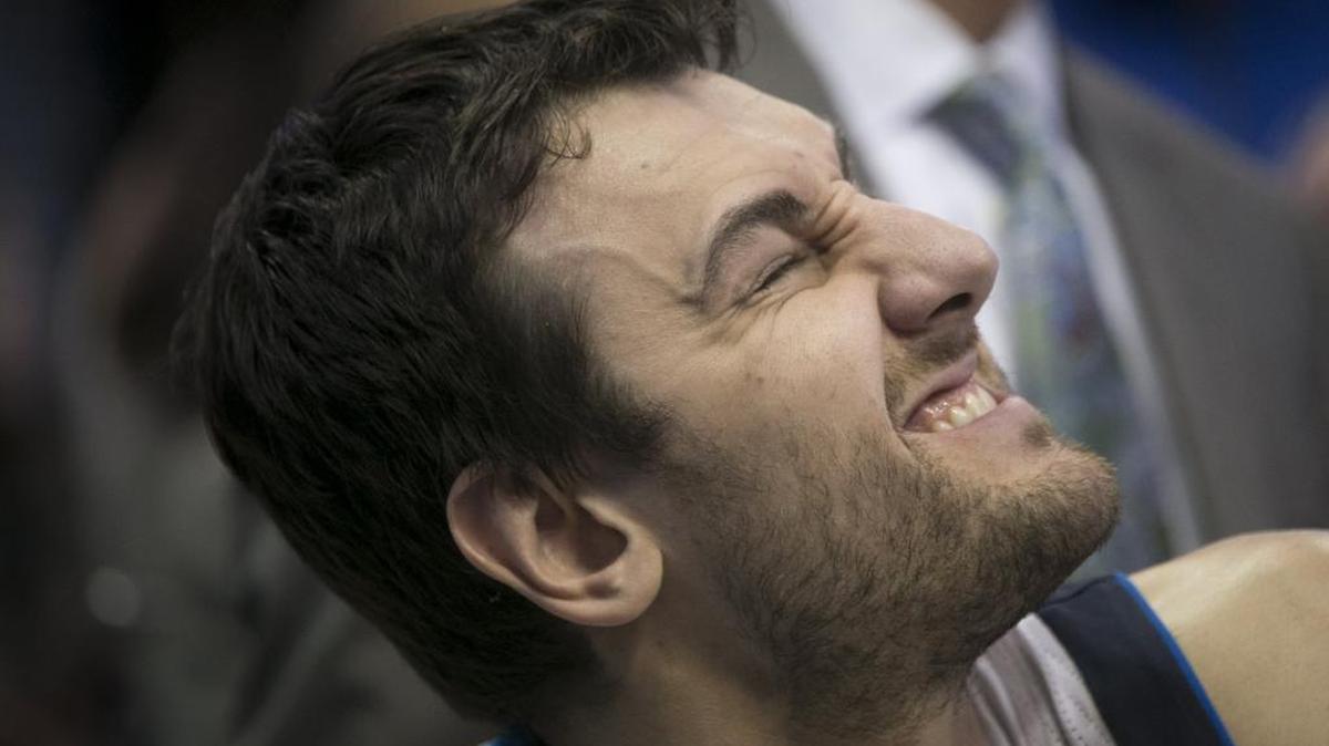 Dallas Mavericks center Andrew Bogut (6) reacts to a knee injury as a trainer applies ice as the Dallas Mavericks beat the Washington Wizards 113-105 at the American Airlines Center in Dallas, Texas, January 3, 2017.