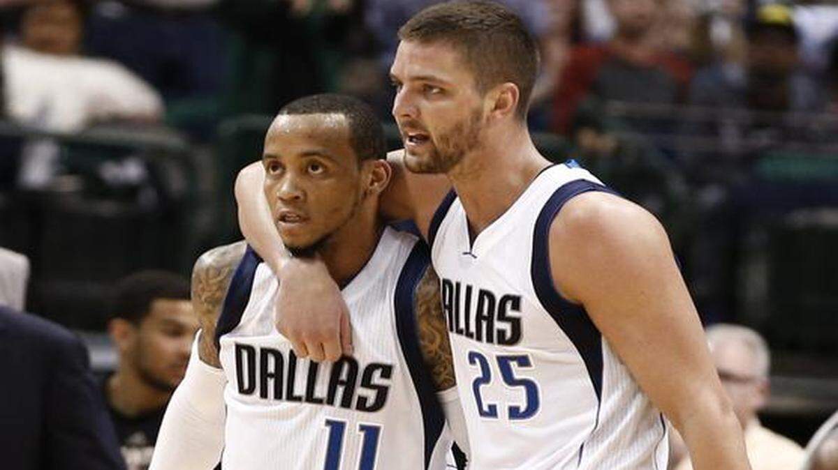 
Monta Ellis, left, scored 38 points while Chandler Parsons added 15 points and six rebounds to lift the Mavs at home.


